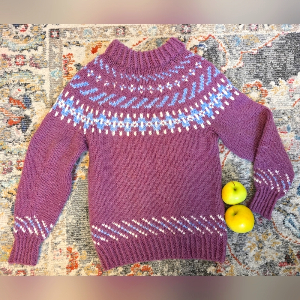 Hand knit sweater. Size XS -S. Material is soft and has some stretch.